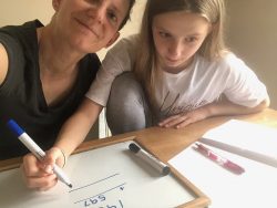 Olivia and Elke doing maths at home